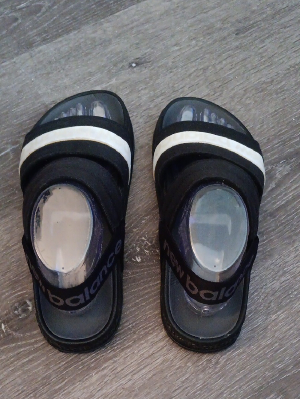 New Balance Black Sandals with White Stripe